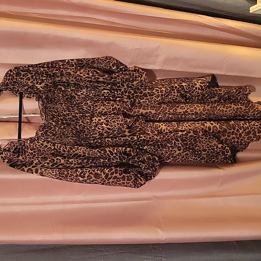 Leopard/cheetah sheer high low blouse